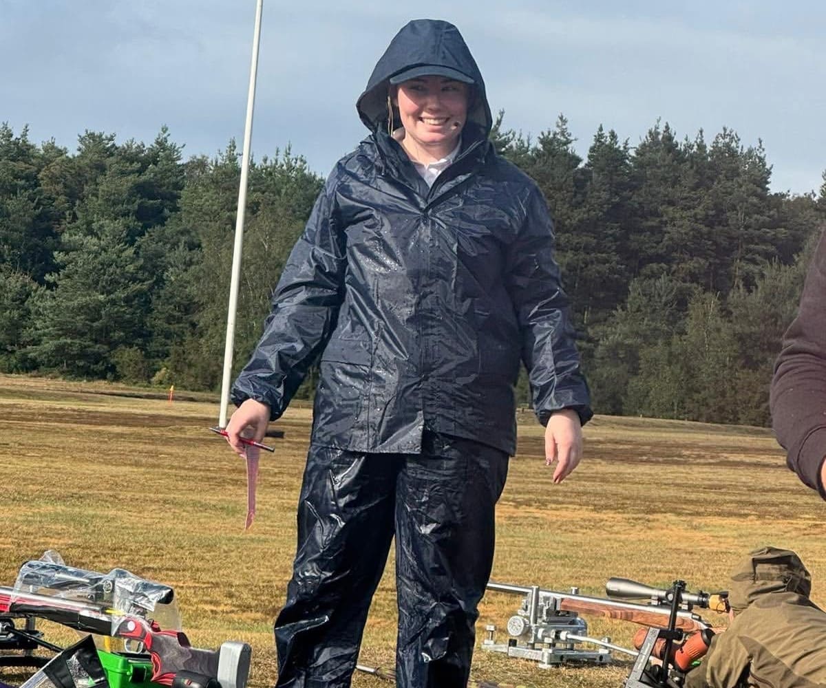 Mia battling the elements competing in Bisley, UK.