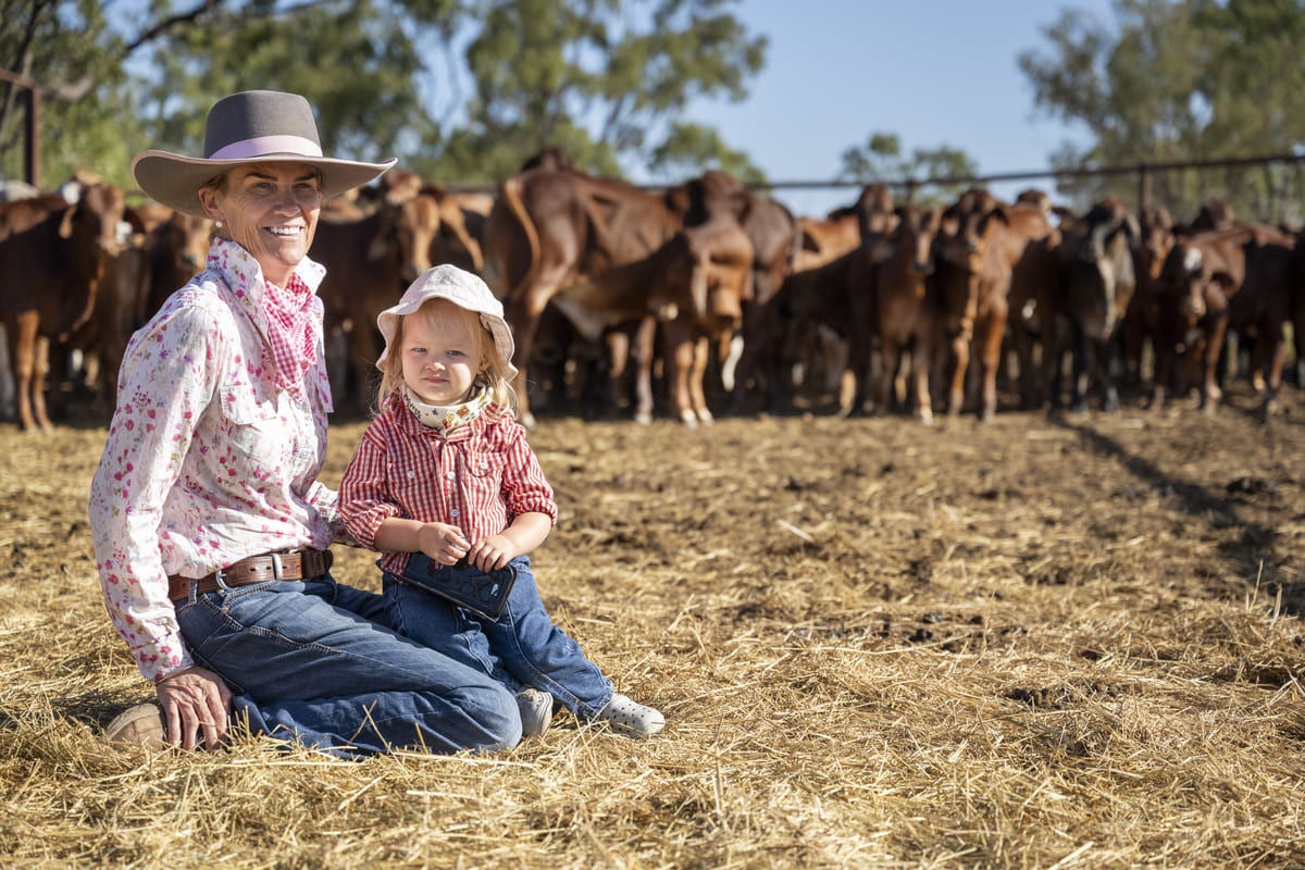 Sonia, with granddaughter Grace, thrives on busy days balancing family, farming and community.