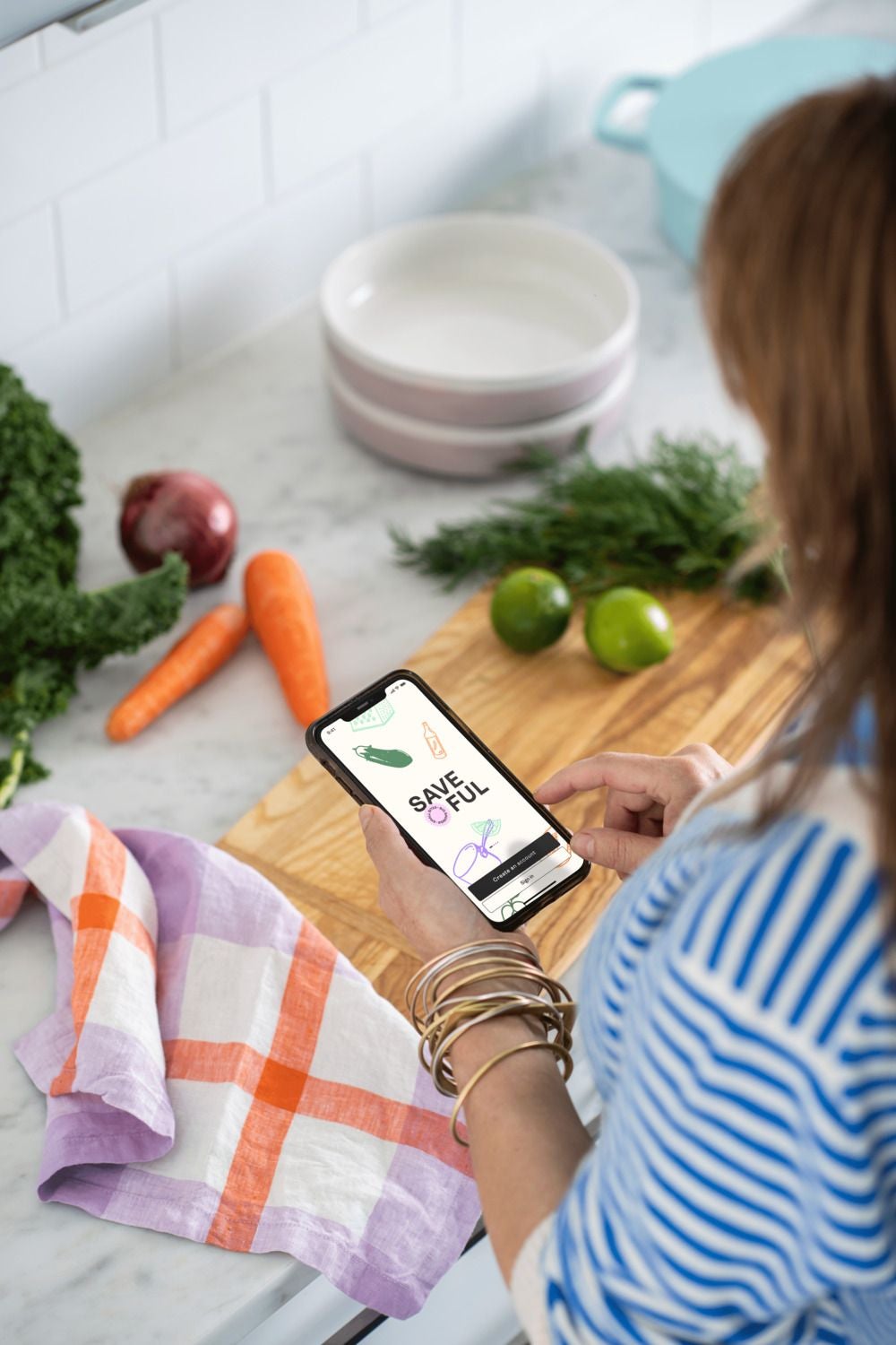 Using Saveful App at a kitchen bench