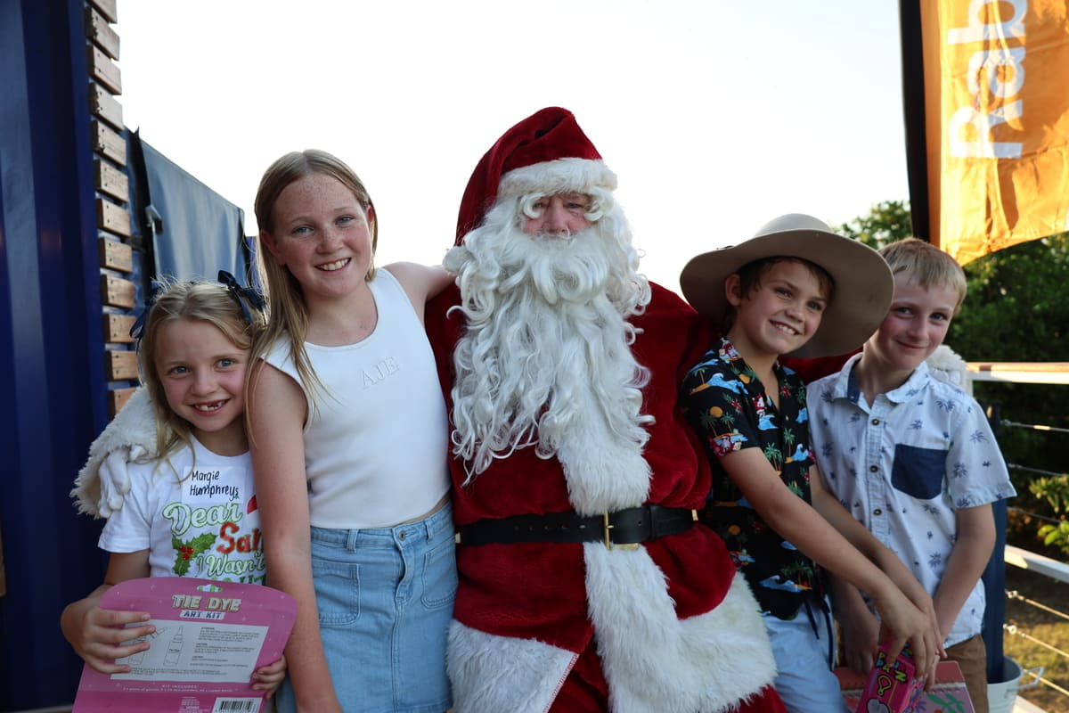 Santa came bearing gifts to very happy children, Margie Humphreys, Frances Poole, Jack Estens and Will Pollard.