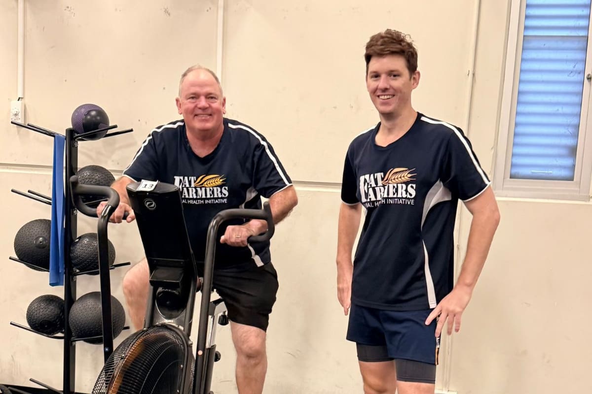 Mark Northcott and Eric Wilson out of Rabobank's Kadina Branch still smiling during a Fat Farmers gym session.