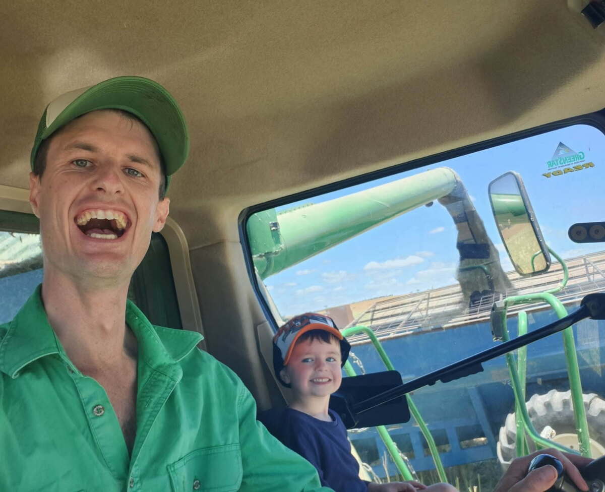Brendan and Bentley love pitching in during harvest.