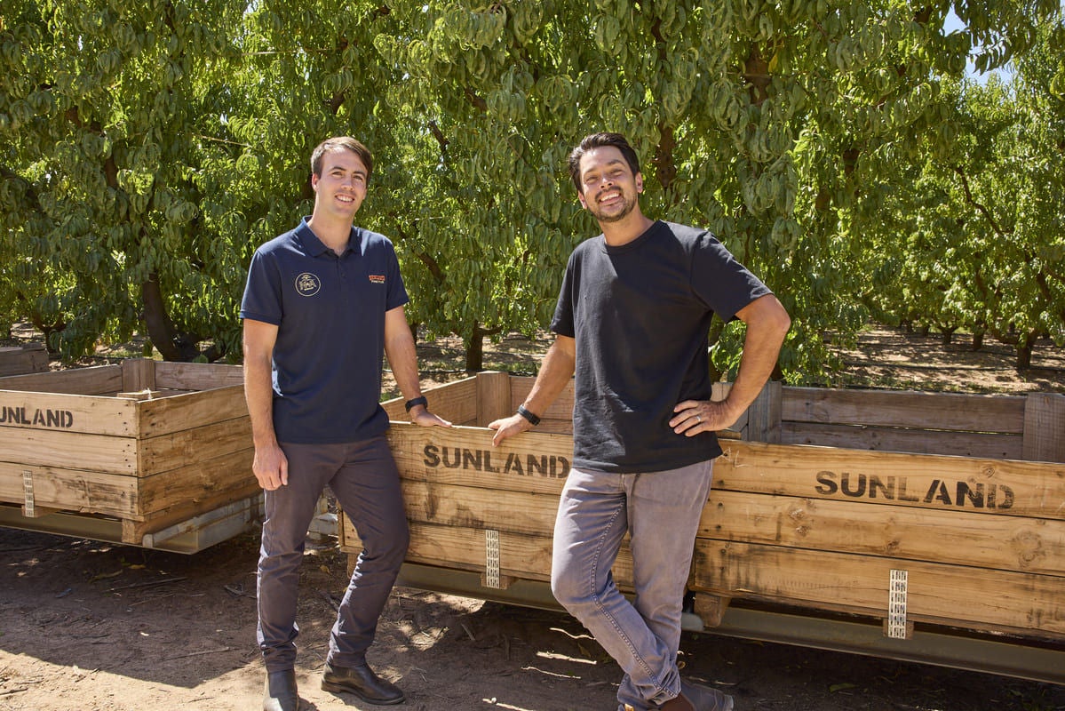 Louis on farm with Willis Cathels