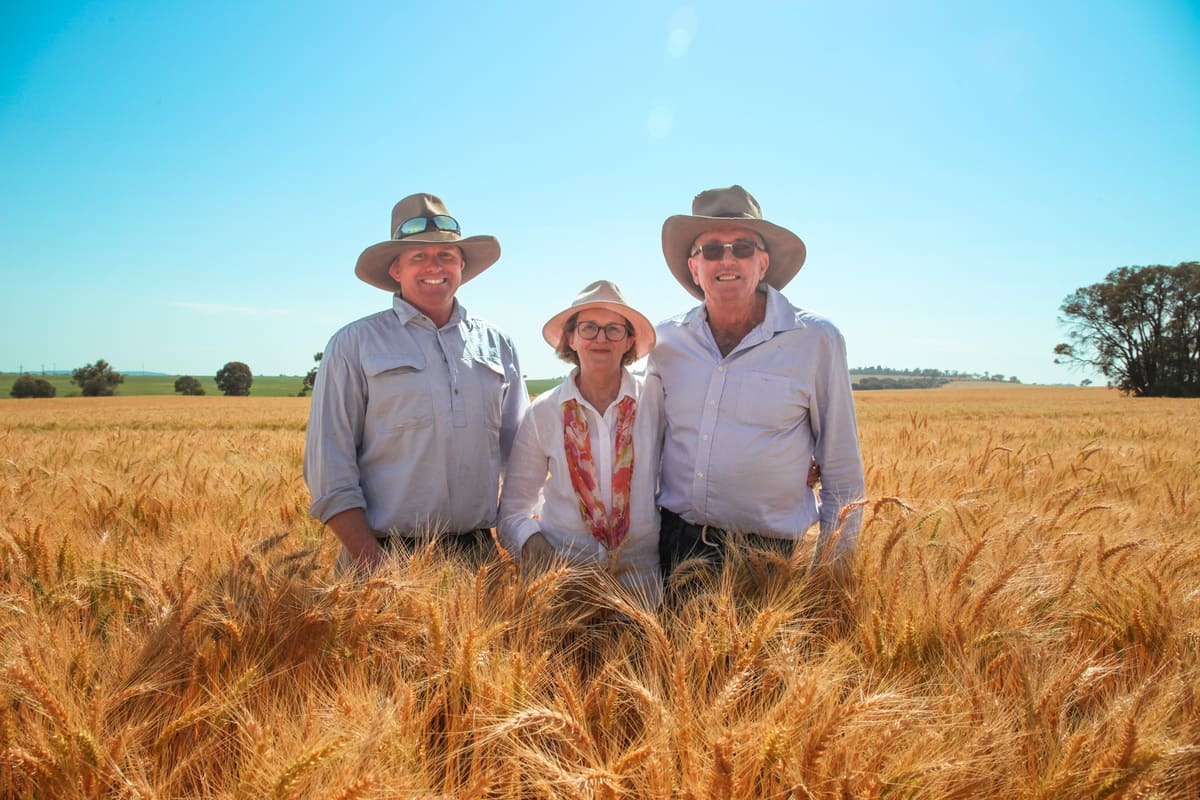 Charles, Faye, and Mark Sullivan at home, pictured on the eve of harvest 2025.